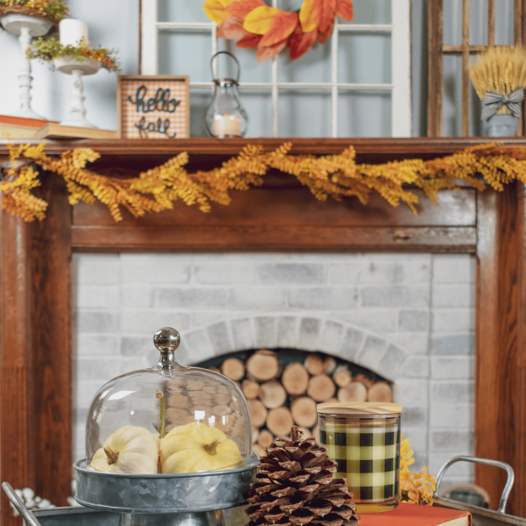 The Review Wire_Fall Decorating Tips Budget-Friendly Ideas for Your Home_Fall Mantle with Leaves